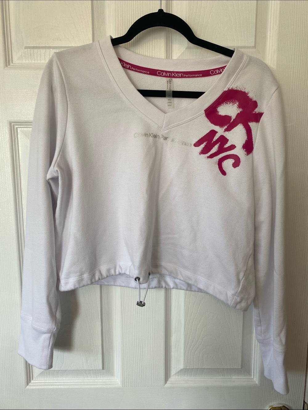Calvin Klein White V-Neck Pullover with Pink Graphic